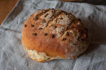 Homemade sourdough bread with raisins, nicely baked with a crust
