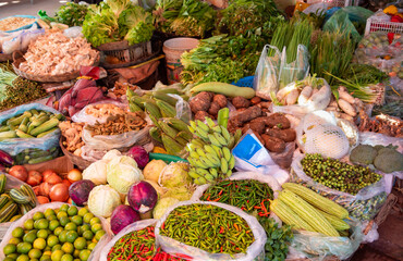 Tropical fruits and vegetables on local street market in Cambodia