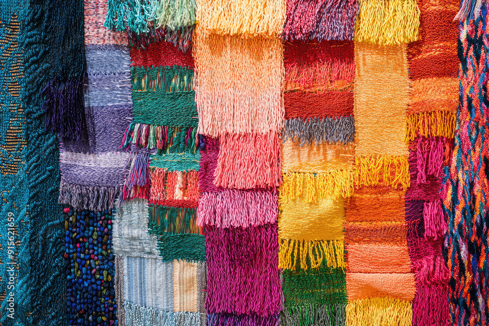 Poster a vibrant tapestry intricately woven with threads of multiple colors, displaying a rich mix of textu