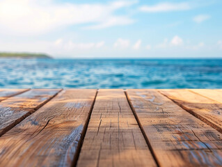 Fototapeta premium Wooden Deck Overlooking a Blue Ocean with a Blurred Background