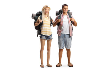 Male and female city tourists with backpacks