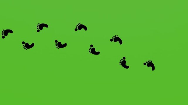 footprints of a man walking on a green screen with his bare feet. 2d animation