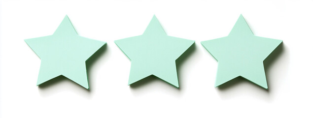 Obraz premium pastel green star-shaped sticky notes, isolated on a white background
