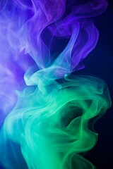 Obraz premium Abstract colorful smoke art in purple and green hues on a dark background.