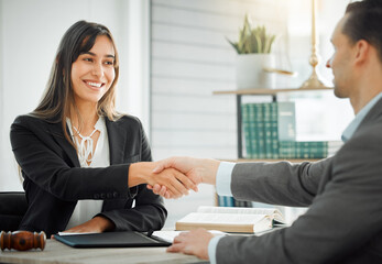 Business people, man and woman with handshake, lawyer and client with deal, contract and partnership. Office, interview or thank you with attorney, legal aid and shaking hand for promotion or welcome