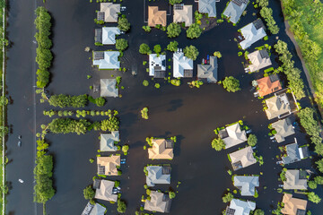 Hurricane Debby tropical rainstorm flooded residential homes in suburban community in Sarasota,...