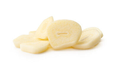 Front view of peeled white garlic cloves in slices or pieces in stack isolated on white background with clipping path