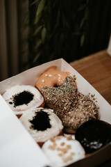 a treat of sweet delicious doughnut in sunny day at the cake shop