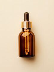 A brown glass beauty product bottle with an amber dropper