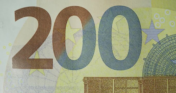 An overview of the 200 euro banknote. Quick frame change with different parts of the banknote in close-up