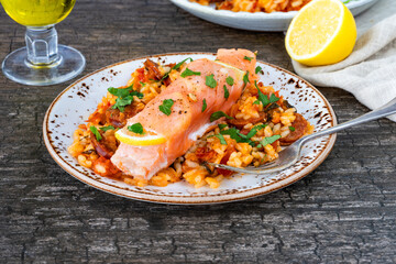 Baked salmon with chorizo rice