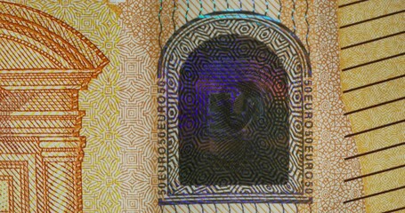 An overview of the 50 euro banknote. Quick frame change with different parts of the banknote in close-up