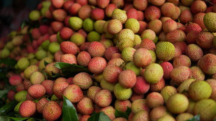 Freshly picked ripe lychees, ready for sale at the market. Vibrant colors and juicy sweetness of this tropical delight, straight from the orchard to your table. Lychee, Litchi, Lichee, fruit