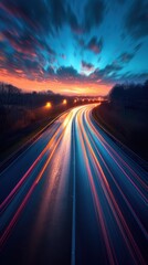 Obraz premium Blurred image of a highway with cars driving on it at sunset