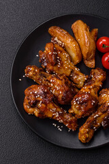 Delicious crispy baked chicken wings in teriyaki sauce