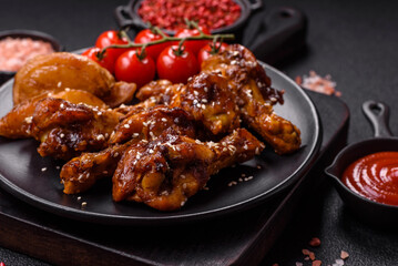 Delicious crispy baked chicken wings in teriyaki sauce
