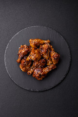 Delicious crispy baked chicken wings in teriyaki sauce