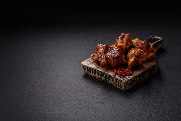 Delicious crispy baked chicken wings in teriyaki sauce