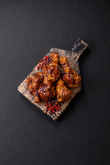 Delicious crispy baked chicken wings in teriyaki sauce