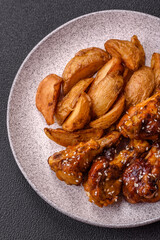 Delicious crispy baked chicken wings in teriyaki sauce