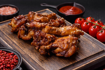 Delicious crispy baked chicken wings in teriyaki sauce