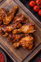Delicious crispy baked chicken wings in teriyaki sauce
