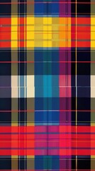A vibrant tartan pattern features squares and lines in multiple colors, displaying textile artistry