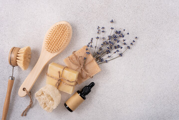 Handcrafted soap bars, wooden massage brushes and lavender flowers