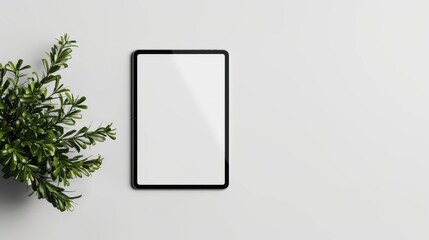 Minimalist Tablet Mockup with Green Plant on White Background