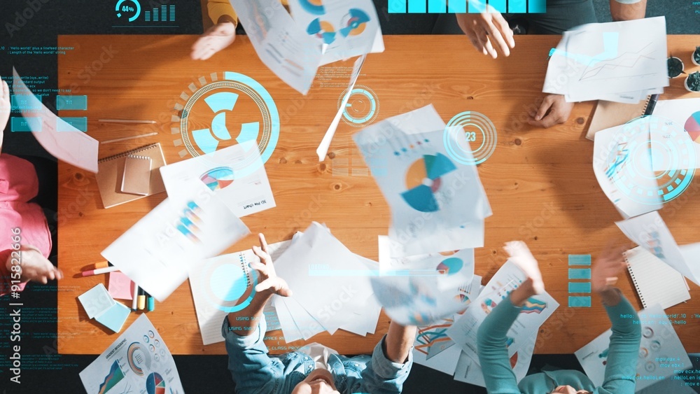 Aufkleber top view of start up business team holding paper while discussing about financial idea. aerial view 