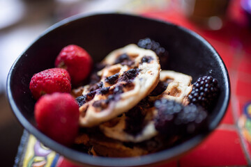 gluten free vegan waffles with a side of fruit