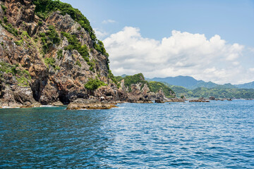 Dramatic karst limstone in the coast of Pacific Ocean in Nachikatsuura, Wakayama, Japan, part of the Yoshino-Kumano National Park and Nanki Kumano geopark.