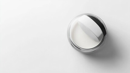 Close-up of an Open Cream Jar on a White Background