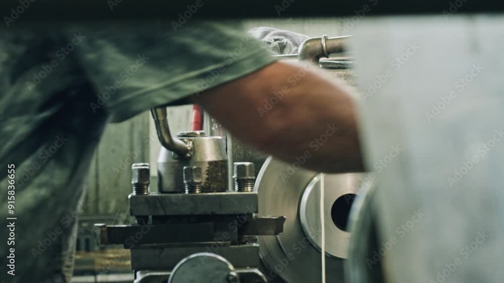 Poster skilled metalworker using lathe machine to shape metal parts in industrial workshop, demonstrating p