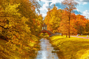Cross Bridge in Alexander Park in golden autumn. Pushkin (Tsarskoe Selo)