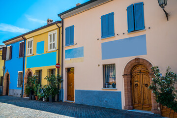 A view down a street in the village area of San Giuliano in Rimini, Italy in summertime