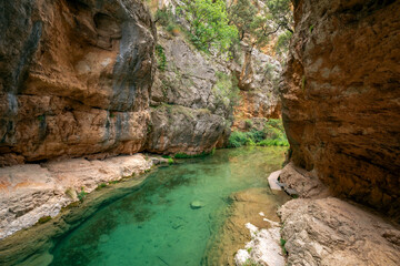 View of a stretch of the impressive Ebron river strait, Teruel, Aragon, Spain, between high rock...