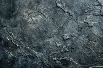 Fototapeta premium A close-up view of a stone wall with visible cracks and texture