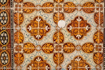 A close up of intricate tile patterns showing the beauty of traditional craftsmanship