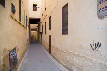 Empty streets of Fes Medina with its typical architecture and narrow paths