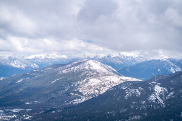 Obraz premium aerial view over trail in Patagonia mountains in San Martín de los Andes in summer with snow