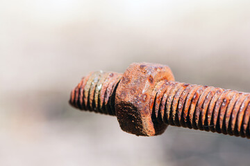 old rusty bolt, iron rod with screw threads. Rusted mechanical components. threaded bolt and nut isolated close up. dismantling concept, difficult to unscrew, non-removable. oxidation, destruction