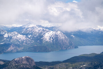 aerial view over trail in Patagonia mountains in San Mart&iacute;n de los Andes in summer with snow
