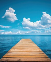 Obraz premium Wooden dock extending into the sea, blue sky with white clouds, background, flat composition