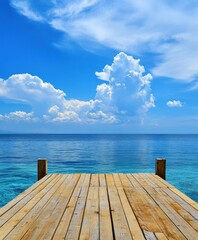 Fototapeta premium Wooden dock extending into the sea, blue sky with white clouds, background, flat composition