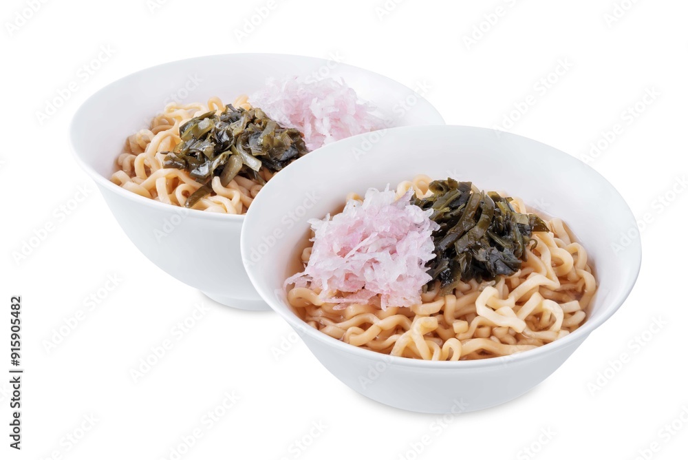 Wall mural Ramen noodles with seaweed and radish in a bowl on a white isolated background