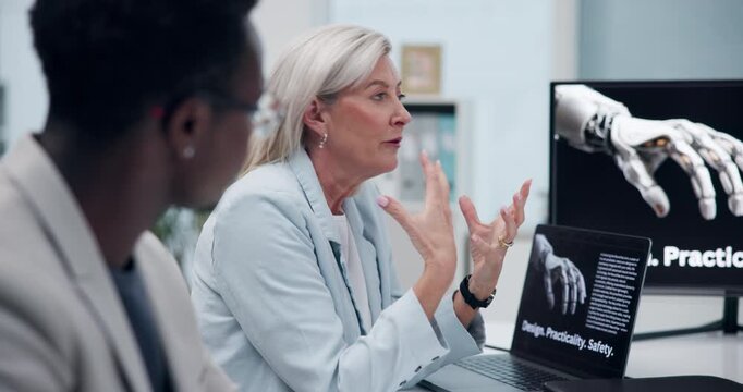 Business people, robotics arm and meeting with computer screen for design, proposal or development in science. Mature leader speaking of engineering practice, training or ideas in software innovation