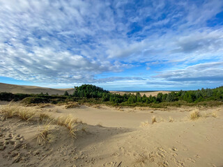 sand dunes and clouds