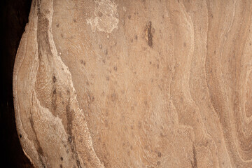 Expensive vintage furniture. The table is covered with epoxy resin and varnished. Luxury quality wood processing. Wooden table on a dark background. Black river made of epoxy resin.