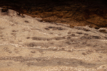 Expensive vintage furniture. The table is covered with epoxy resin and varnished. Luxury quality wood processing. Wooden table on a dark background. Black river made of epoxy resin.